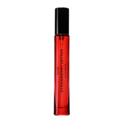 PHLUR bottle front view showing compact 9.5 mL and bright label, perfect for travel
