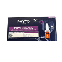 PHYTO applying vial directly to scalp demonstrating precise, no-drip targeted application