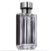 Prada L'homme front bottle showing elegant glass and cap, offering luxury presentation