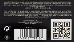 Prada Luna Rossa sprayed on wrist outdoors suggesting fresh marine energy and longevity