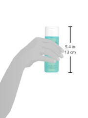 Proactiv toner beside a 4 fl oz measurement guide, demonstrates compact travel-friendly size