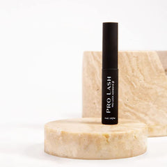 Pro Lash applicator brush close-up for precise glue application and controlled placement