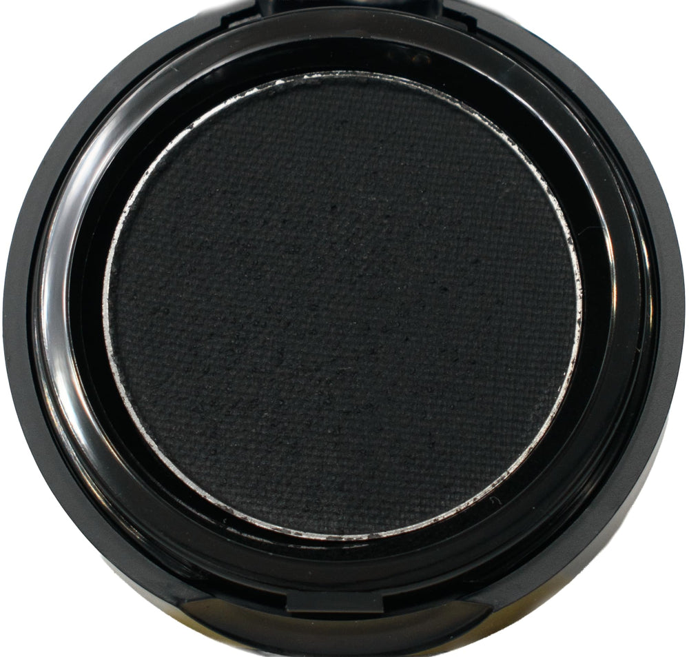 Pure Ziva compact front view showing sleek packaging and matte black cake for portability