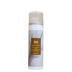 R+Co Bright Shadows front bottle view showing precise nozzle and instant coverage benefit