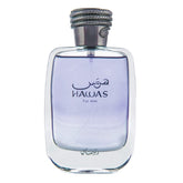Rasasi Hawas bottle front showing elegant grey glass and label, conveys refined presence