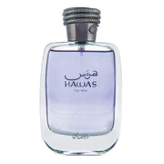Rasasi Hawas bottle front showing elegant grey glass and label, conveys refined presence