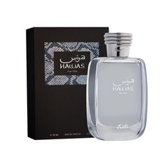 Rasasi Hawas closeup of python-style stopper and texture, highlights premium detail