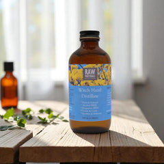 RAW MATERIALS bottle on bathroom vanity illustrating daily skincare use and convenience