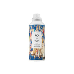 R+Co SAIL front bottle view showing lightweight spray for shiny soft waves