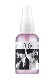 R+Co front bottle view showing sleek packaging and brand finish