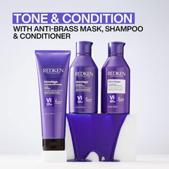 Redken Blondage conditioner being applied to blonde hair to neutralize brass