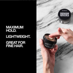 Redken Brews pomade open showing gritty clay texture for volume