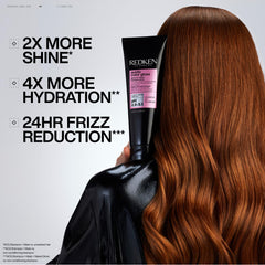 Redken mask in hand ready to apply for fast one-minute treatment