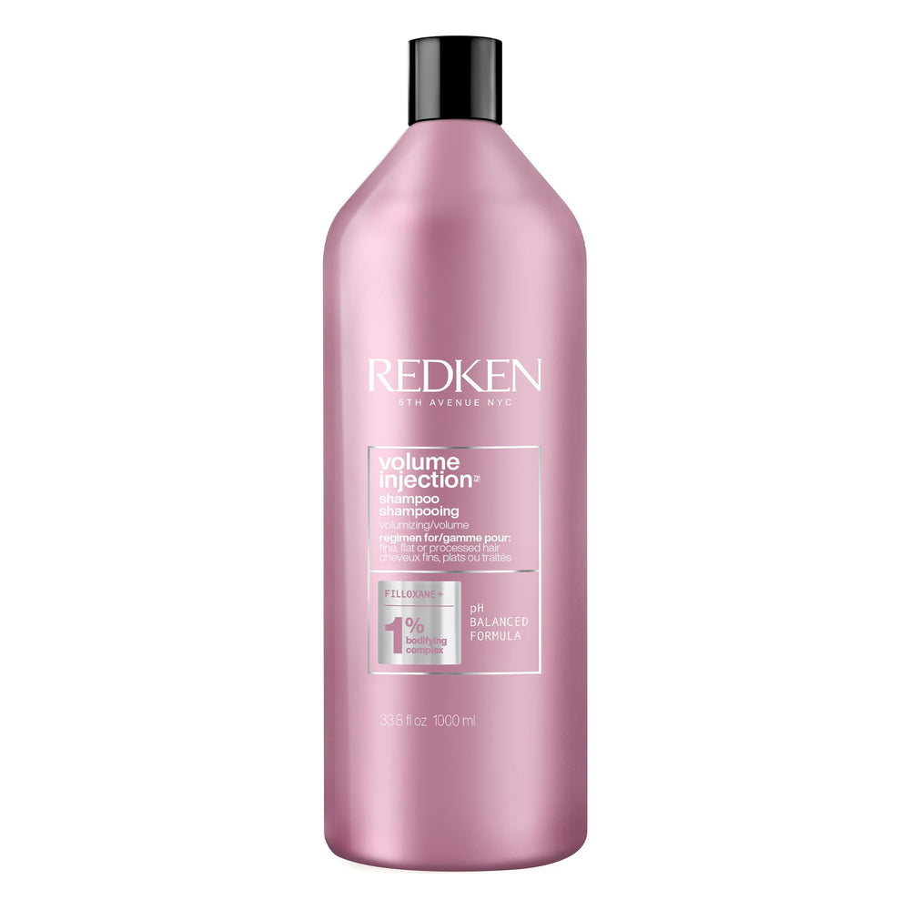 Redken bottle front view showing product and benefits