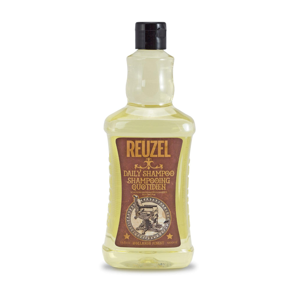 REUZEL bottle front view shows label and large 33.81 oz size, easy refill benefit