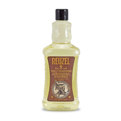 REUZEL bottle front view shows label and large 33.81 oz size, easy refill benefit