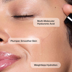 Revision Skincare drop of serum on fingertip demonstrating precise, non-greasy application benefit