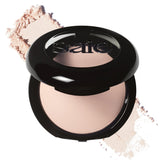 Saie Slip Tint compact front view showing sleek packaging and portability