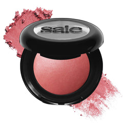 Saie closed compact showing sleek front and portable design benefit