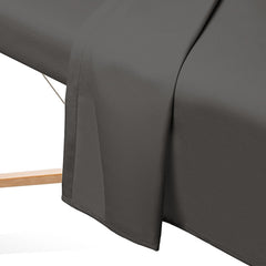 Saloniture face cradle cover on crescent pillow for hygienic, comfortable support