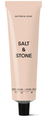 Salt & Stone front tube showing saffron and cedar scent and compact size for travel