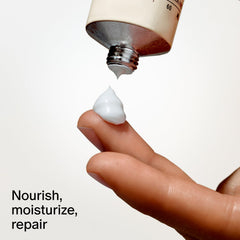 Salt & Stone tube beside everyday items showing portable 2 fl oz convenience