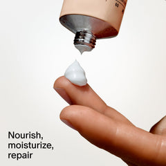 Salt & Stone next to keys and phone illustrating 2 fl oz travel-friendly size