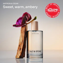 Salt & Stone mist spraying from bottle demonstrating easy application