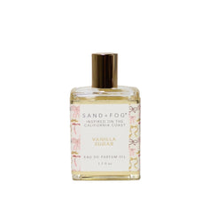 Sand + Fog front bottle with pink and gold accents showing elegant design and travel benefit