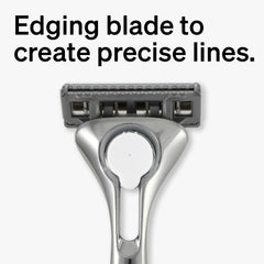 Schick Quattro Titanium lubricating strip close-up for smoother shaving glide