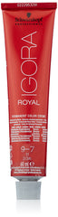 Colourist applying Schwarzkopf IGORA Royal with brush for precise, salon-grade results