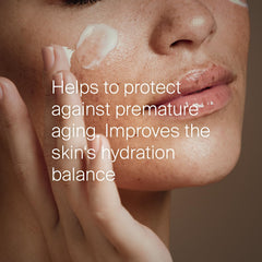 SEBAMED applying cream to hand to show non-greasy finish and comfort