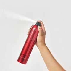 SexyHair mist spraying over hair to demonstrate lightweight lift and coverage