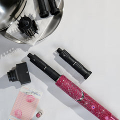 Shark oval brush attachment displayed to smooth and add volume during styling
