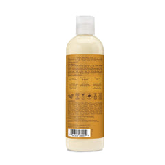 Shea Moisture 13 oz size next to common items demonstrating bottle scale convenience