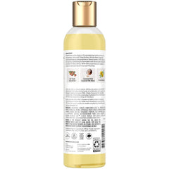 Shea Moisture pour closeup capturing lightweight oil texture that absorbs quickly for non-greasy hydration