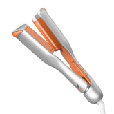 SHEGLAM waver front view showing compact two-barrel design and ergonomic grip benefit