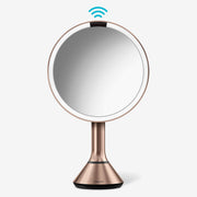 simplehuman front view of rose gold mirror showing sleek design and cordless benefit