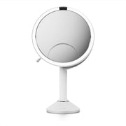 simplehuman round mirror front view showing clean design and accurate reflection