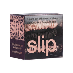 SLIP scrunchie held in hand to show scale, demonstrates slim profile and discreet hold
