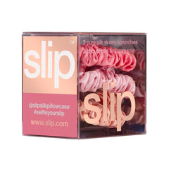 SLIP scrunchie securing a low ponytail with minimal creasing benefit