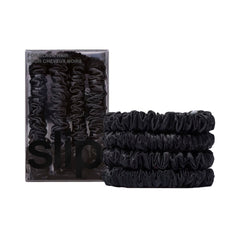SLIP black scrunchies front packaging showing set of four, sleek protection