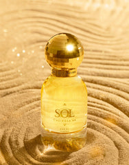 Sol de Janeiro perfume glass detail showing liquid color and texture