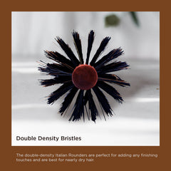 SPORNETTE brush beside hand showing three-inch barrel for volumizing large sections