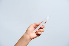 StackedSkincare blade in use on upper lip demonstrating safer targeted touchup
