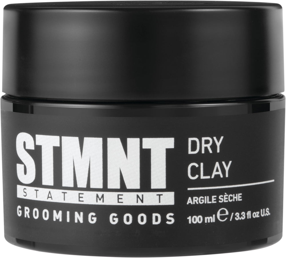 STMNT dry clay tin front view showing compact packaging and matte finish