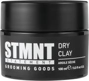 STMNT dry clay tin front view showing compact packaging and matte finish