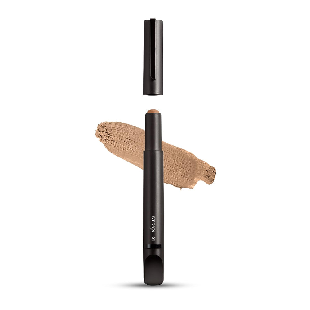 Stryx concealer front packaging showing compact, discreet design and shade label