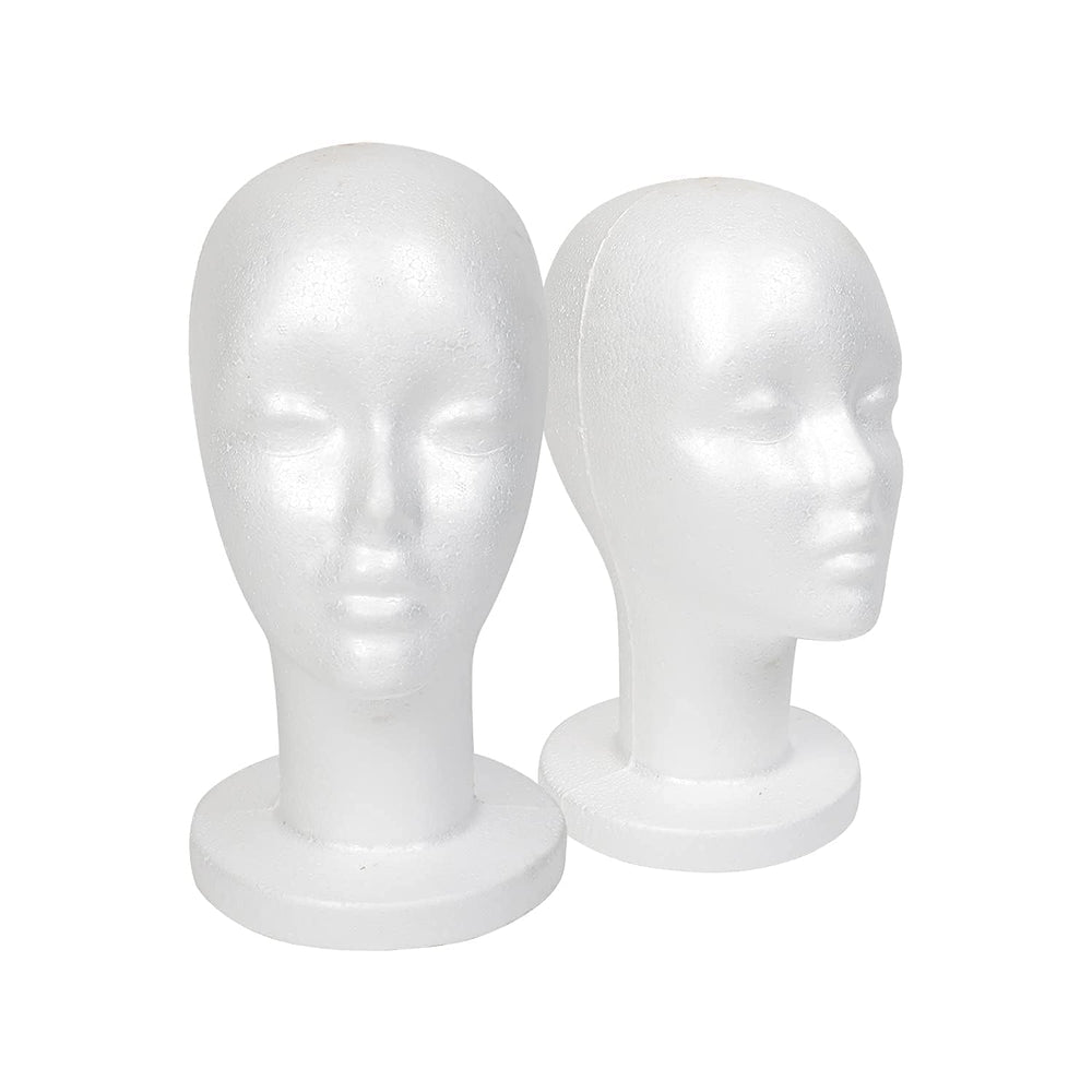 STUDIO LIMITED front view of two mannequin heads showing clean white finish and balance
