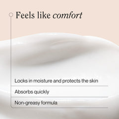 Person applying Suave lotion to hands demonstrating fast relief for dry skin